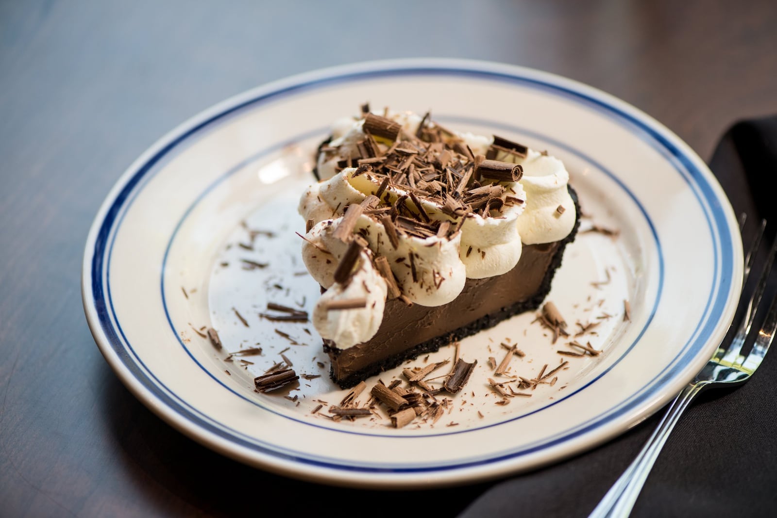 Chocolate Cream Pie with Oreo crust, vanilla whipped cream, and chocolate shavings. Photo credit- Mia Yakel.