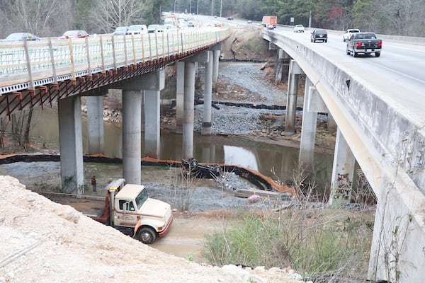 Officials said the truck veered into the median and went through a construction zone before striking a gravel embankment that caused it to become airborne. (Credit: Cherokee County Sheriff’s Office)