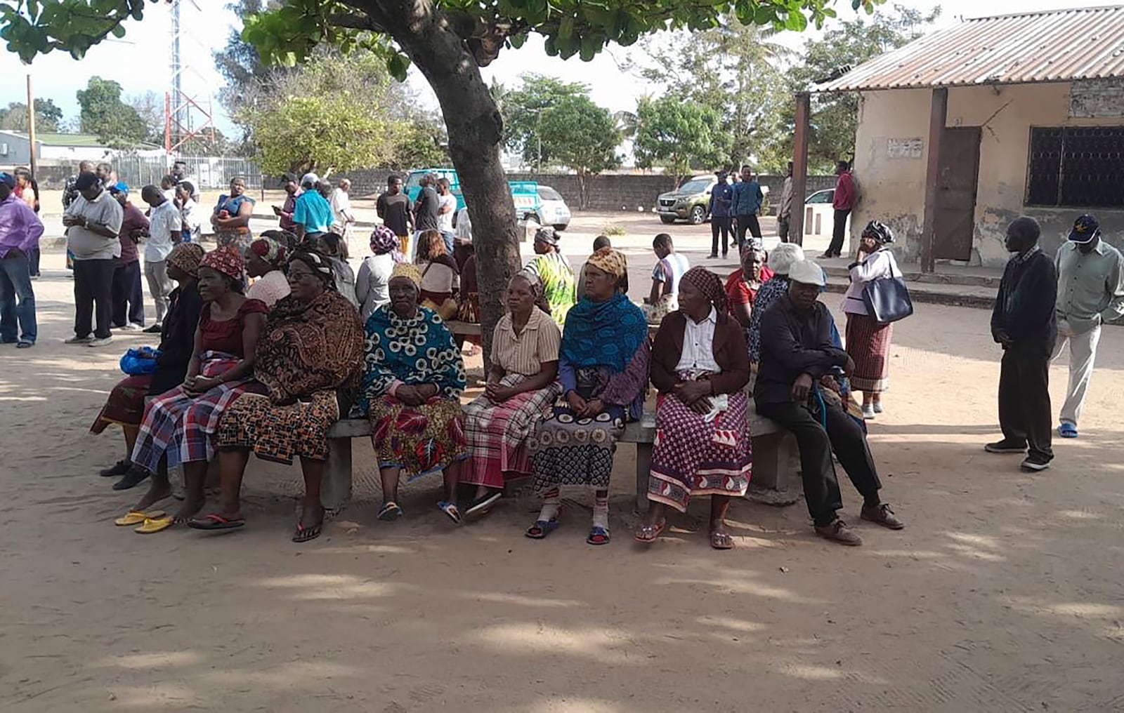 People queue to cast their votes during the general elections in Maputo, Mozambique, Wednesday, Oct. 9, 2024. (AP Photo/Charles Mangwiro)