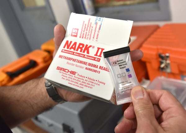 December 19, 2018 Lilburn — Lilburn Police Captain Scott Bennett holds a Nark II methamphetamine test reagent kit at Lilburn Police Department. The Lilburn police are not involved in the lawsuit over inaccurate test results. HYOSUB SHIN / HSHIN@AJC.COM