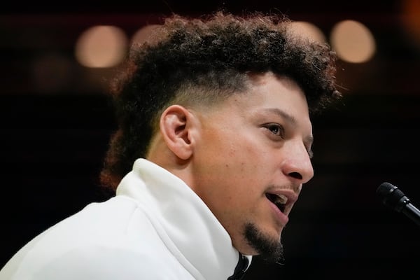 FILE - Kansas City Chiefs quarterback Patrick Mahomes (15) participates during Super Bowl 59 Opening Night, Monday, Feb. 3, 2025, in New Orleans, ahead of the NFL football game between the Philadelphia Eagles and the Kansas City Chiefs Sunday. (AP Photo/Matt York, File)