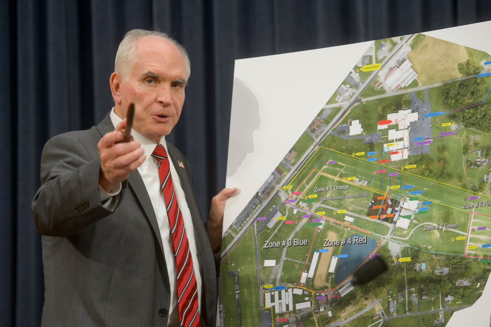 Chairman Rep. Mike Kelly, R-Pa., speaks in front of a site map at the first public hearing of a bipartisan congressional task force investigating the assassination attempts against Donald Trump, at Capitol Hill in Washington, Thursday, Sept. 26, 2024. (AP Photo/Ben Curtis)