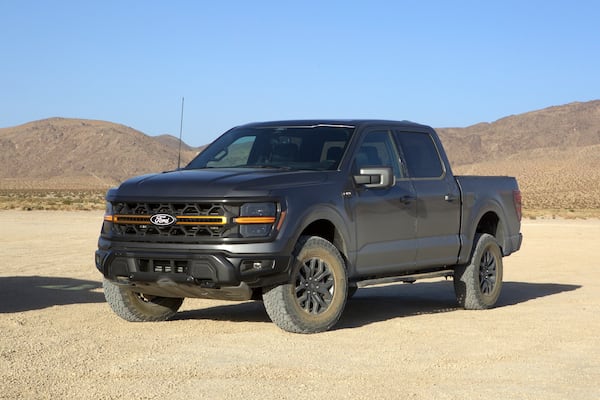 This photo provided by Edmunds shows the 2025 Ford F-150 Tremor, which features standard four-wheel drive, a choice of two V8s, and Trail Turn Assist, a feature that brakes the inside rear wheel to tighten the turning radius. (Courtesy of Edmunds via AP)