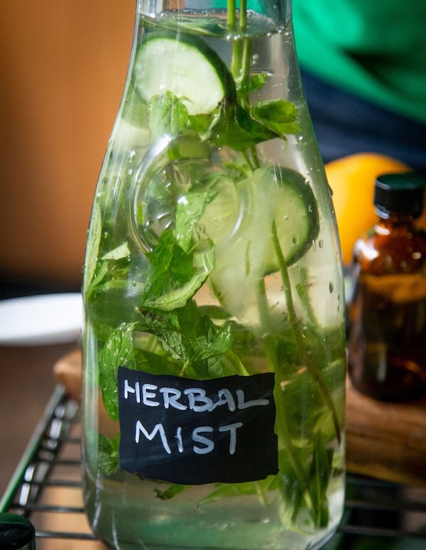 Owner of Iwi Fresh Farm-to-Skin Spa Yolanda Owens makes up a hydration face mist in her Atlanta spa Wednesday, July 01, 2020. STEVE SCHAEFER FOR THE ATLANTA JOURNAL-CONSTITUTION