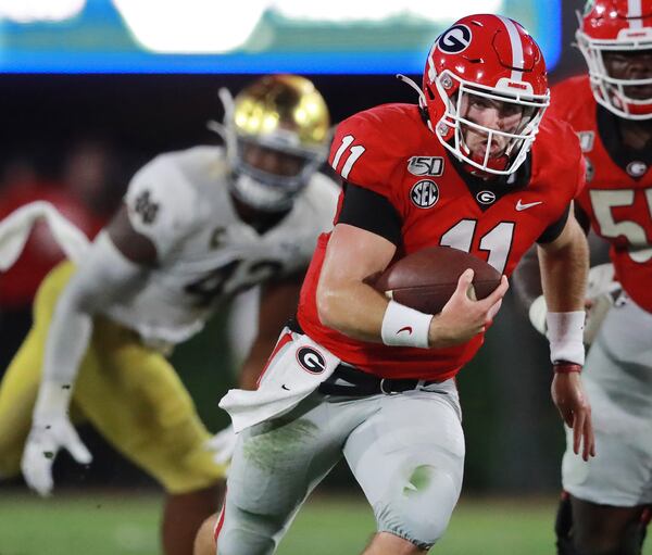 Georgia quarterback Jake Fromm runs for yardage against Notre Dame.