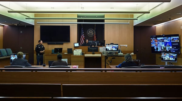 Chief Judge Cassandra Kirk presides over cases in the Fulton County Magistrate Court on Thursday, Dec. 12, 2024, in Atlanta. She says only four of nine courtrooms can operate at a time unless the county provides more funding for staff. (Hyosub Shin/AJC)