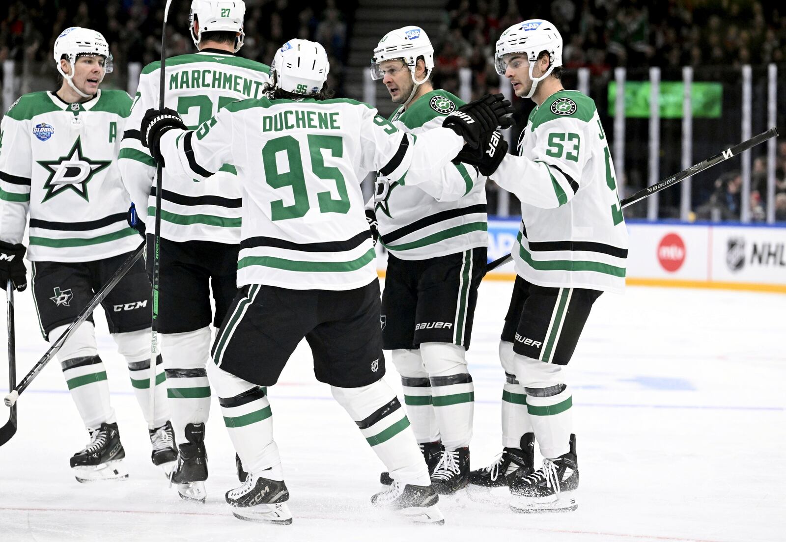 Dallas Stars players, from left, Miro Heiskanen, Mason Marchment, Matt Duchene, Evgenii Dadonov and Wyatt Johnston (53) celebrate a goal during an NHL hockey game agains the Florida Panthers, Saturday, Nov. 2, 2024, in Tampere, Finland. (Heikki Saukkomaa/Lehtikuva via AP)