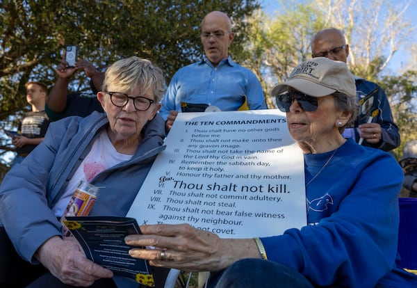 Faith leaders, activists, and supporters of Jessie Hoffman, Jr., pray outside the entrance to Louisiana State Penitentiary in Angola, La., as Hoffman is executed Tuesday, March 18, 2025. (Chris Granger/The Times-Picayune/The New Orleans Advocate via AP)