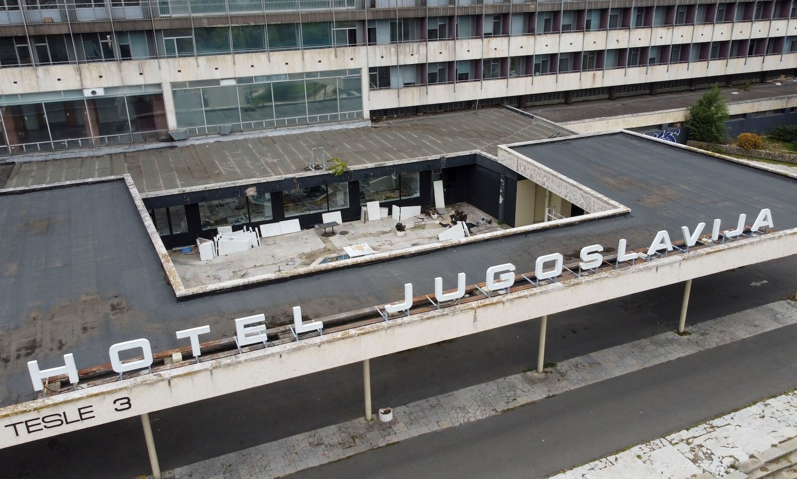 A view of Hotel Yugoslavia, once a symbol of progress in the former socialist state of Yugoslavia that broke apart in the 1990s and a favorite gathering place for local residents as well as world leaders, in Belgrade, Serbia, Thursday, Oct. 3, 2024. (AP Photo/Darko Vojinovic)