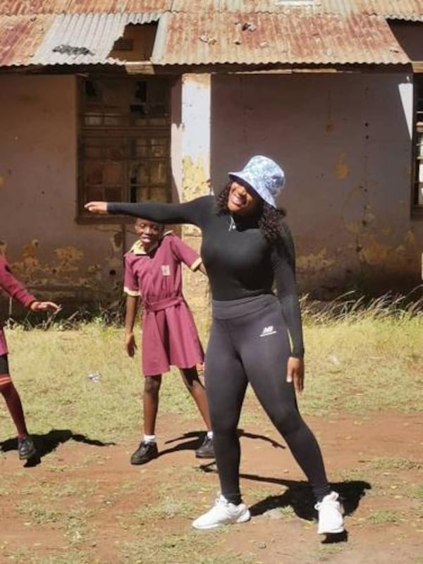 Peace Corps volunteer Shanya McWhinney works with girls in a health and wellness program in Botswana. (Photo provided by Shanya McWhinney)