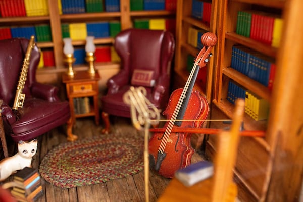 A mysterious donor was turning the Millers' Little Free Library into a Lilliputian garden apartment. (Photo/Rebecca Wright for the Atlanta Journal-Constitution)