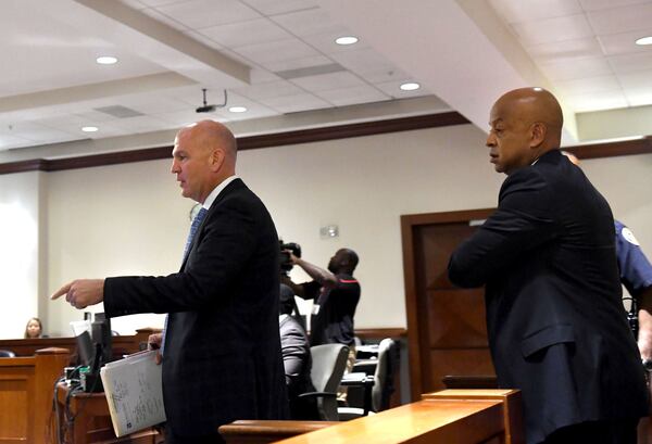 Attorney Noah Pines (left) and Dekalb County Sheriff Jeff Mann (right) walk into the courtroom at the Atlanta Municipal Court in Atlanta on July 27, 2017. DeKalb County Sheriff Jeff Mann pleaded guilty to charges of obstruction and prohibited conduct stemming from his arrest in Piedmont Park. (Photo by Rebecca Breyer)