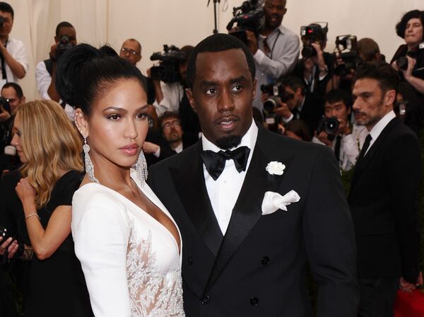 Cassie Ventura, left, and Sean "Diddy" Combs arrive at The Metropolitan Museum of Art's Costume Institute benefit gala celebrating "China: Through the Looking Glass" on Monday, May 4, 2015, in New York. In November 2024, Ventura filed a civil suit against Combs, alleging physical and sexual abuse. (Photo by Charles Sykes/Invision/AP)