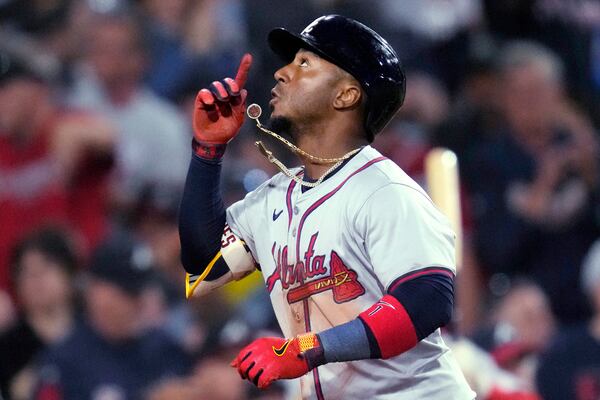 Ozzie Albies celebrating his home run.