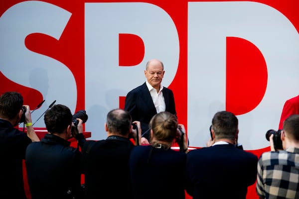 German Chancellor Olaf Scholz arrives for a news conference at the Social Democratic Party (SPD) headquarters in Berlin, Germany, Monday, Feb. 24, 2025. (AP Photo/Ebrahim Noroozi)