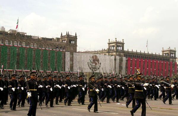 A military parade makes its way through the main square during the independence day celebration September 16, 2002 in Mexico City, Mexico. Mexico is celebrating 192 years of independence from Spain.