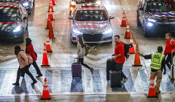 November 17, 2023 Hartsfield-Jackson International Airport: North Terminal air travelers filled the airport Friday, Nov. 17, 2023 as the busy holiday period comes as the airport is in the midst of an array of construction projects that have caused disruptions for travelers.(John Spink / John.Spink@ajc.com)

