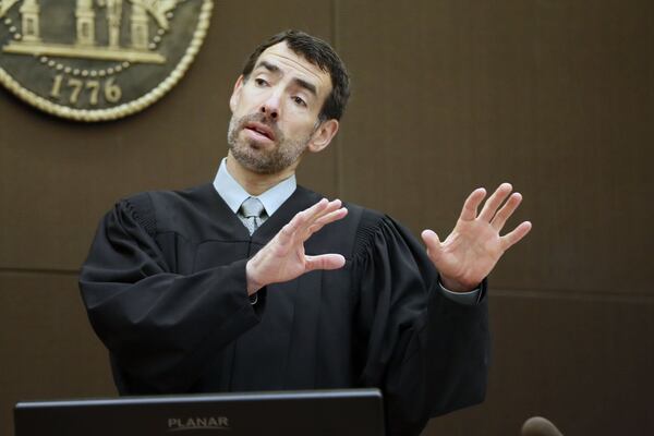 4/17/18 - Atlanta - Fulton County Chief Judge Robert McBurney instructs the jury as final arguments were set to begin during the Tex McIver murder trial at the Fulton County Courthouse. Bob Andres bandres@ajc.com