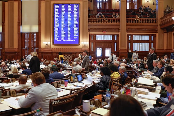 Lawmakers gather in the House Chambers on Thursday, the last day of the legislative session.