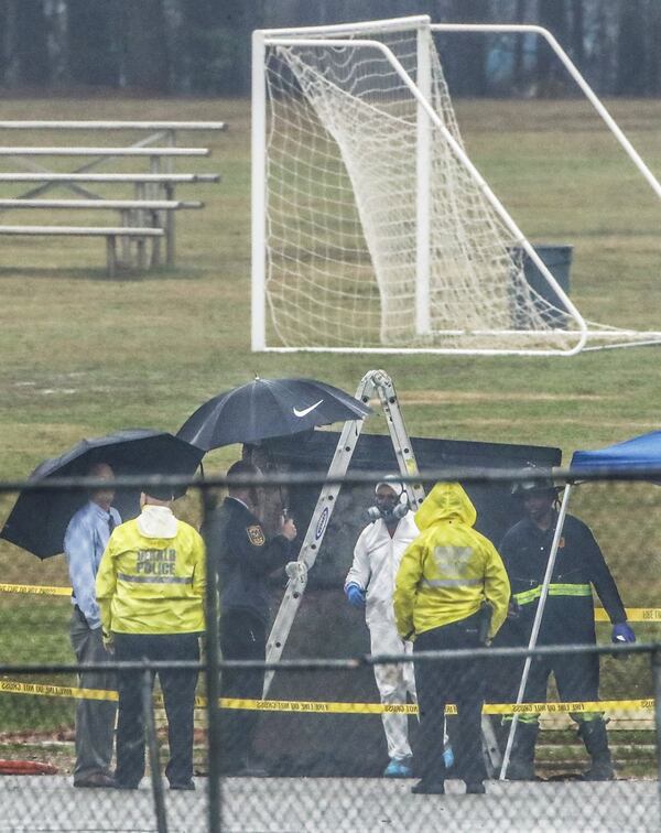 Maintenance workers found a burned body on Feb. 28, 2019, at a DeKalb County park. The body was discovered by a dumpster at about 7:30 a.m. at the Southeast Athletic Complex on Hillvale Road near Lithonia, DeKalb police told AJC.com. JOHN SPINK/JSPINK@AJC.COM