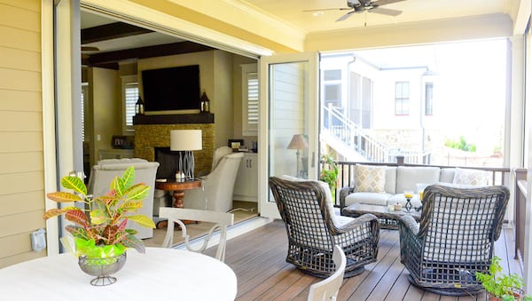 One of Anne Storey's favorite spaces in her Roswell home is the back porch. Accordion doors open the kitchen and living area to this space.