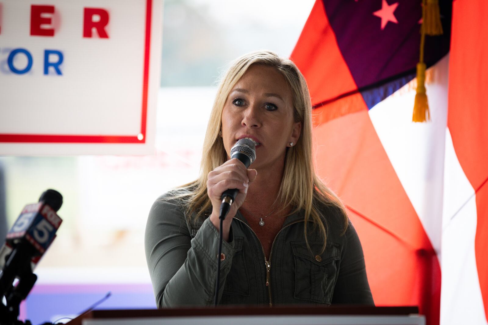 In this file photo, Georgia Republican House candidate Marjorie Taylor Greene endorses Sen. Kelly Loeffler (R-GA) during a press conference on October 15, 2020 in Dallas, Georgia. Greene won the race for Georgia's 14th Congressional District on Tuesday. (Dustin Chambers/Getty Images/TNS)