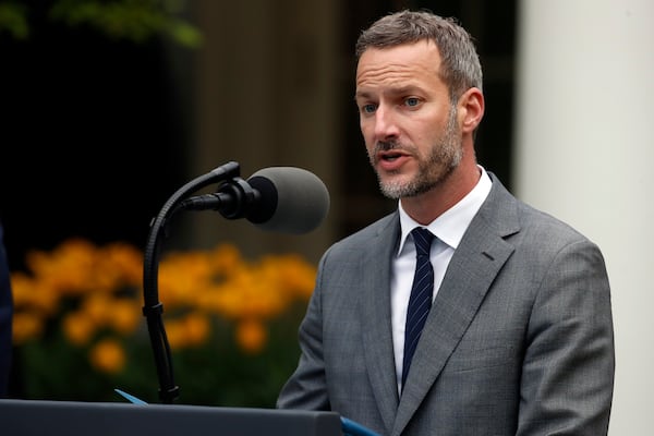 FILE - Adam Boehler, CEO of U.S. International Development Finance Corporation, speaks in the Rose Garden of the White House, April 14, 2020, in Washington. (AP Photo/Alex Brandon, File)