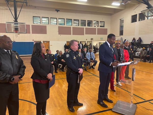 Atlanta Mayor Andre Dickens, alongside Atlanta Police Chief Darin Schierbaum, Fulton County DA Fani Willis and other officials talk about the reduction of crime in 2024 in Atlanta.