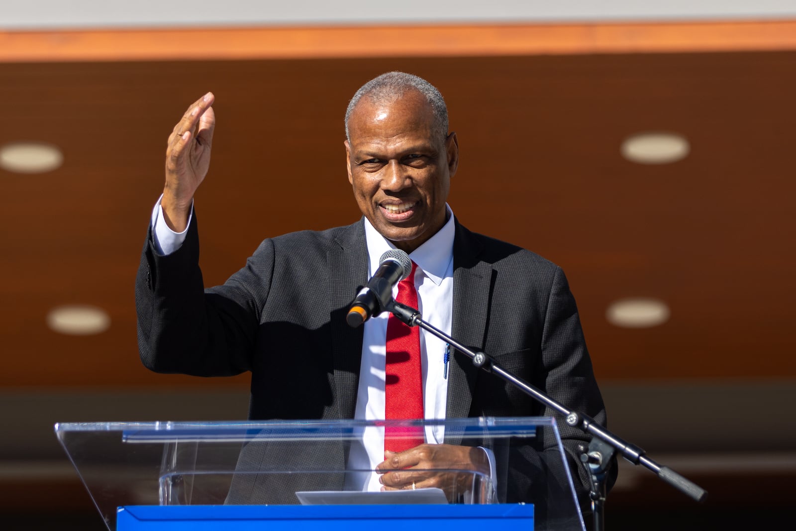 Egbert Perry, chairman of the Integral Group, speaks at the grand opening ceremony for the new apartment building Veranda at Assembly in Doraville on Thursday, September 19, 2024. The Assembly redevelopment site was formerly a GM plant. (Arvin Temkar / AJC)