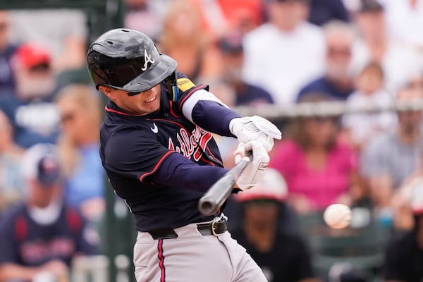 Atlanta Braves Nick Allen hits an RBI single in the third inning of a spring training baseball game against the Minnesota Twins in Fort Myers, Fla., Saturday, Feb. 22, 2025. (AP Photo/Gerald Herbert)