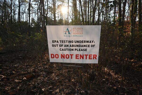 Shortly after the EPA issued its order, Atlanta Public Schools posted signs warning students and staff to stay off potentially affected parts of the Crawford Long Middle School campus. APS says that the system has also alerted parents through letters, app notices, emails, robo calls and texts. (Hyosub Shin / Hyosub.Shin@ajc.com)