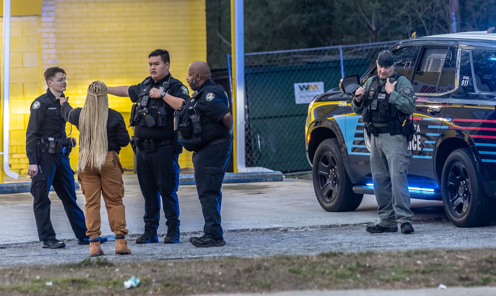 A security guard and his suspected assailant were both shot during the struggle over a gun at the Discount Food Mart on Martin Luther King Jr. Drive in southwest Atlanta the morning of March 15, 2024. 