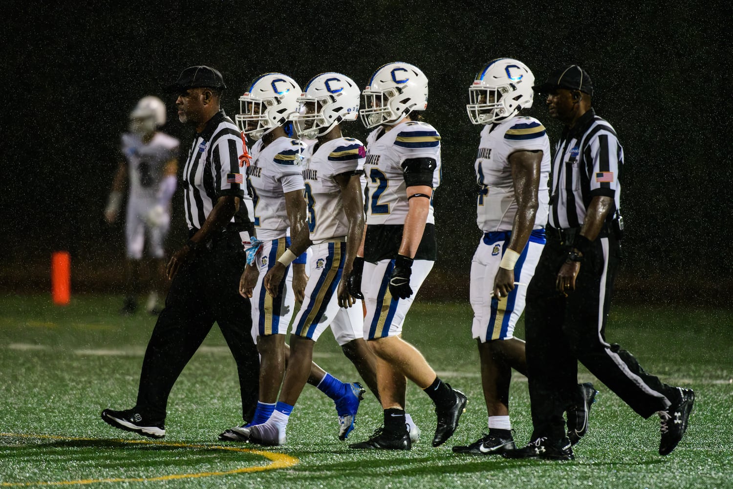 Chamblee captains take the field during their game against Tucker, October 6, 2023. (Jamie Spaar for the Atlanta Journal Constitution)