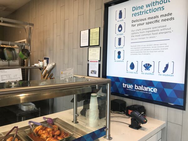 “The dreaded freshman 15 was a real thing with my college cohort in the early 1990s,” writes AJC dining editor Ligaya Figueras, who explores healthy, plant-based eating options on campuses at Emory, Georgia Tech and Georgia State. Pictured are foods and signage at True Balance, a food station at West Village on the Georgia Tech campus. LIGAYA FIGUERAS / LFIGUERAS@AJC.COM