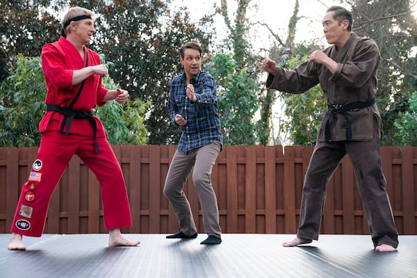 A scene from "Cobra Kai": (L to R) William Zabka as Johnny Lawrence, Ralph Macchio as Daniel LaRusso, Yuji Okumoto as Chozen in Cobra Kai. Cr. Curtis Bonds Baker/Netflix © 2024