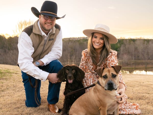 State Rep. Tyler Paul Smith, R-Breman, and Shannon Basford, included pups Abby (left) and Wendy (right) in their engagement photo. (Courtesy photo)