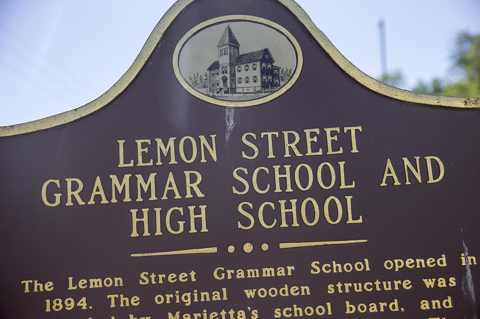 6/14/2019 — Marietta, Georgia — A historical marker is displayed outside of the old Lemon Street Grammar School, located at 350 Lemon Street, in Marietta, Friday, June 14, 2019. The grammar school opened in 1951 and closed in 1971. (Alyssa Pointer/alyssa.pointer@ajc.com)