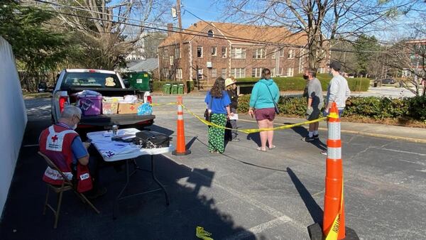 Volunteers are assisting eight residents who were displaced Wednesday morning when a fire broke out in the basement of their Decatur apartment building.