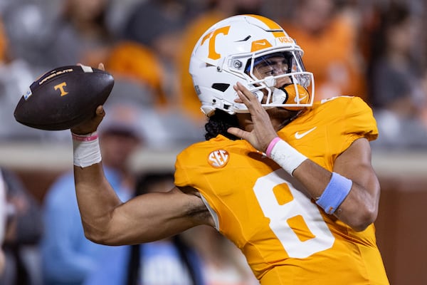 Tennessee quarterback Nico Iamaleava (8) throws to a receiver during warmups before an NCAA college football game against Mississippi State, Saturday, Nov. 9, 2024, in Knoxville, Tenn. (AP Photo/Wade Payne)