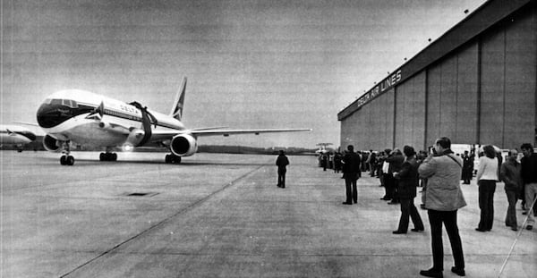 December 15, 1982 -- On the tarmac at Hartsfield, Delta employees greet a Boeing 767 jet that they purchased. The "Spirit of Delta" is still on display at the Delta Flight Museum. (AJC file)