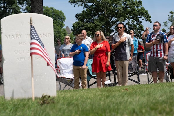 Visitors participated in the Memorial Day ceremony at Marietta National Cemetery on Monday.