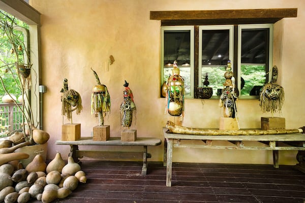 Gourd sculptures on display on the porch of Michael Pierce's home in Farmington.
(Courtesy of Terry Allen)