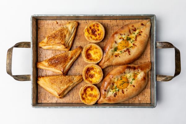 Spinach Turnover, Egg Tarts and Georgian Egg Bread from Juniper Cafe. / Photo by Eric Sun