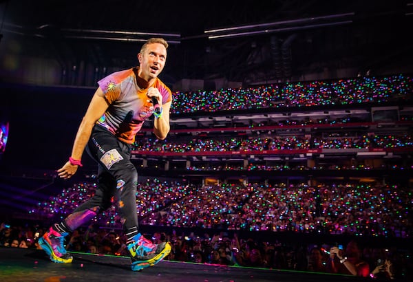 Coldplay, featuring energetic lead singer Chris Martin, brought its Music of the Spheres World Tour to Mercedes-Benz Stadium in Atlanta on Saturday night, June 11, 2022. (Ryan Fleisher for The Atlanta Journal-Constitution)