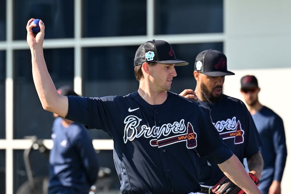 Atlanta Braves starting pitcher Kyle Wright warms up during Braves spring training at CoolToday Park, Saturday, Feb. 18, 2023, in North Port, Fla.. (Hyosub Shin / Hyosub.Shin@ajc.com)