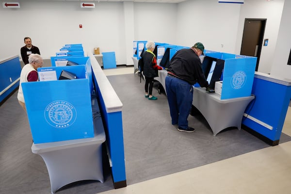 People cast their votes at the Gwinnett County Voter and Registration on Feb. 19, 2024, the first day of early voting in the Georgia presidential primary. (Miguel Martinez / miguel.martinezjimenez@ajc.com)