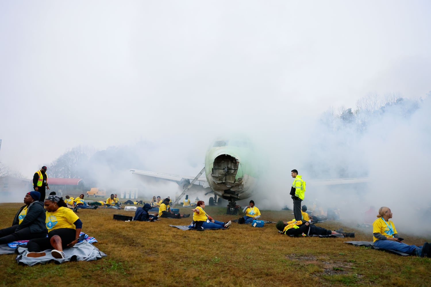 Volunteers are seen participating as fake victims during a full-scale disaster drill at Hartsfield-Jackson International Airport  with Atlanta Firefighters, law enforcement, rescue personnel, and nearly 70 volunteers who participated in a triennial exercise known as “Big Bird” on Wednesday, March 6, 2024
Miguel Martinez /miguel.martinezjimenez@ajc.com