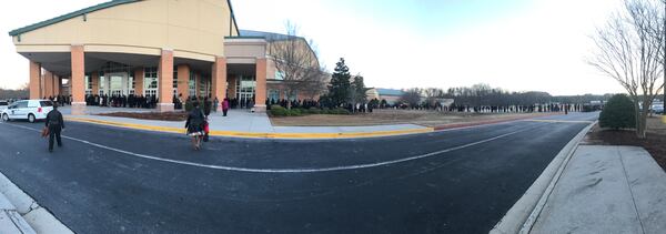 Mourners arrive at New Birth Missionary Baptist Church for Bishop Eddie L. Long's funeral.