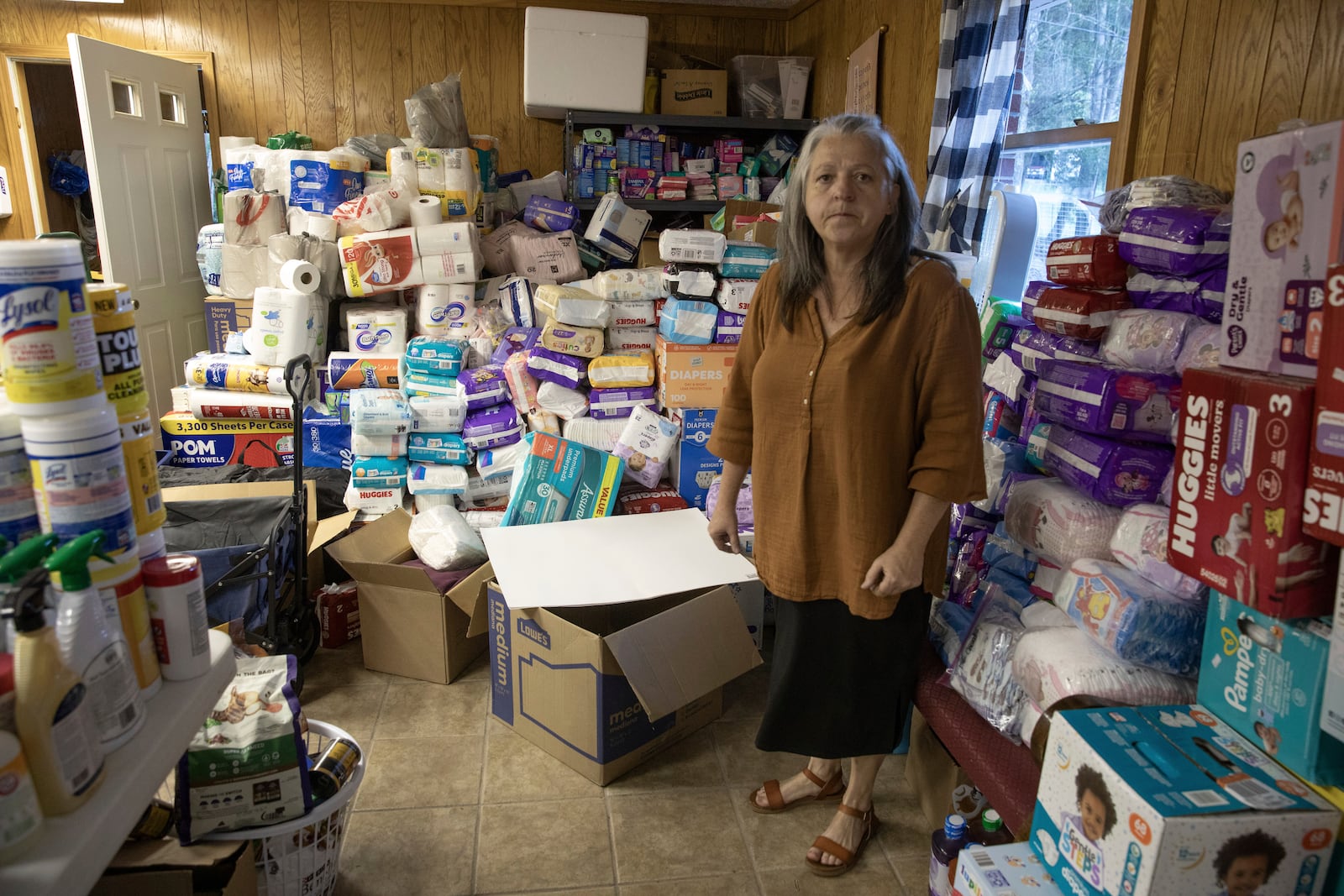 Pam Phillips has been running a resource hub for neighbors out of the Beans Creek Church of the Lord Jesus Christ in Bakersville, N.C. on Oct. 9, 2024. (AP Photo/Gabriela Aoun Angueria)