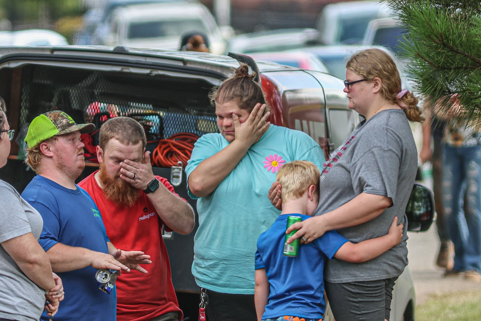 Family members outside the home on Macedonia Road.